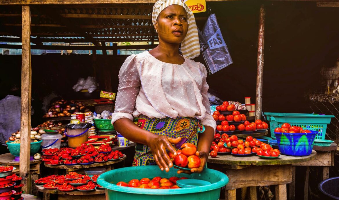 woman holding tomatoes